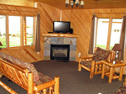 The living area has a gas fireplace and cable TV.
