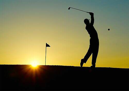 golfer at sunset