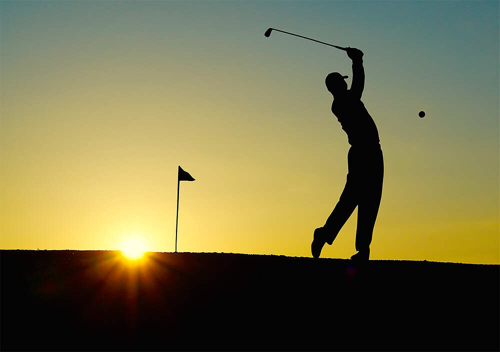 golfer at sunset