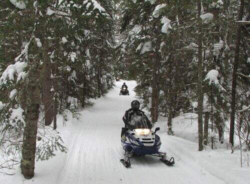 Groomed snowmobile trails that connect with the Minnesota snowmobile trail system