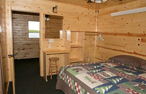White Oak upstairs bedroom #1 with king bed and ceiling fan