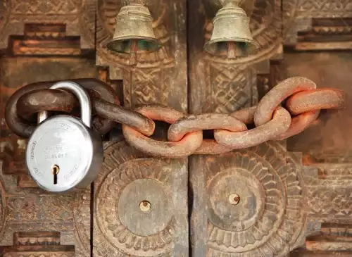 Door with a chain and lock