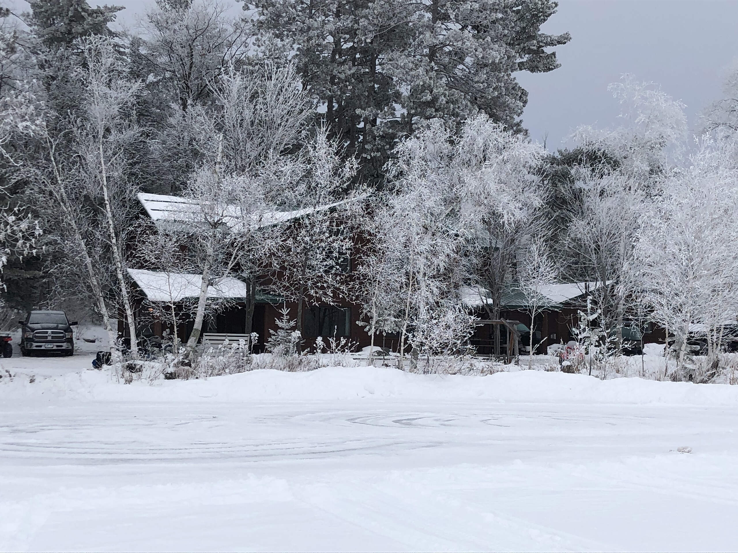 oak lodge in the snow