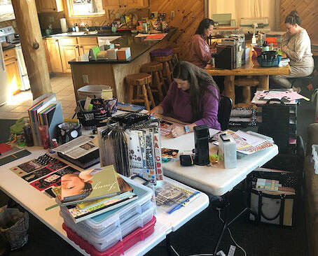 women crafting in a cabin